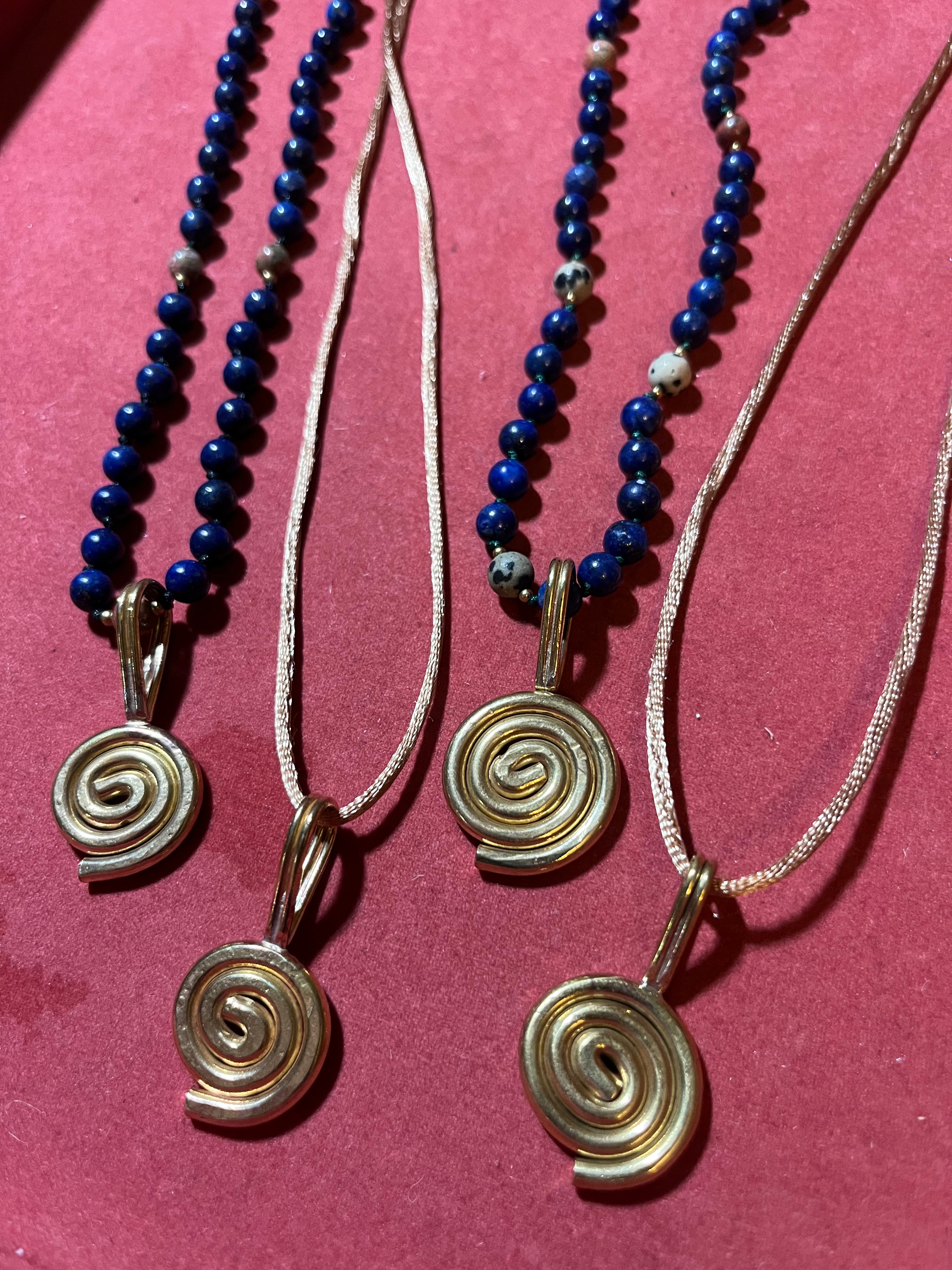 Portal Pendants in Brass